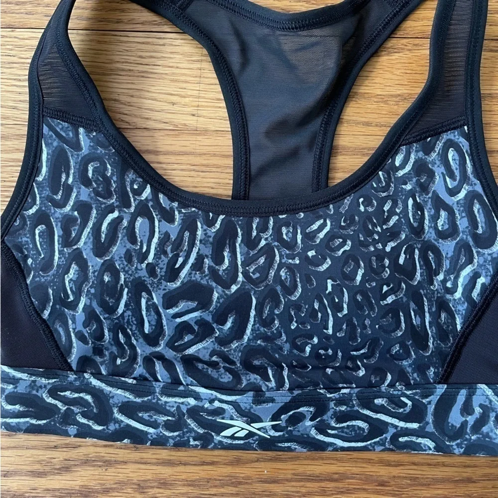 NEW Reebok TS Lux Racerback Sports Bra Leopard Black Size XS NWT